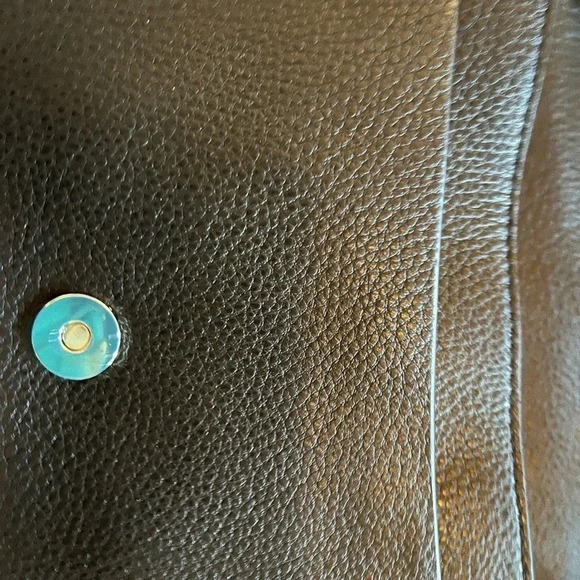 This is a NWT Kate Spade purse in black pebble leather with gold furnishings. - Picture 9 of 9